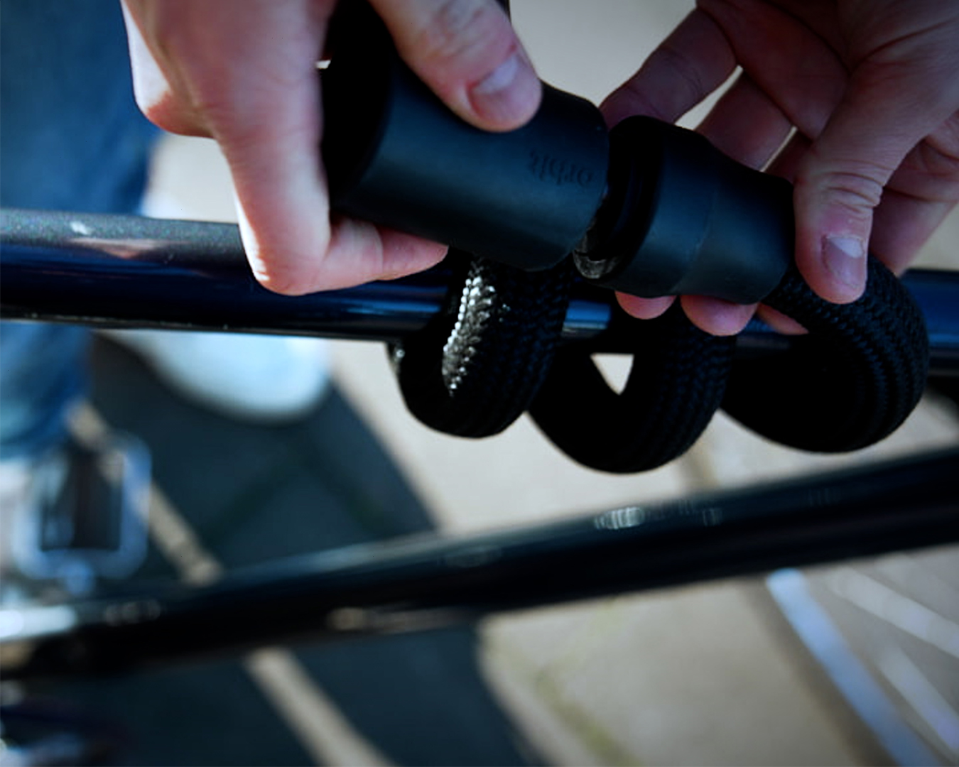 black tex–lock orbit closing around bike frame
